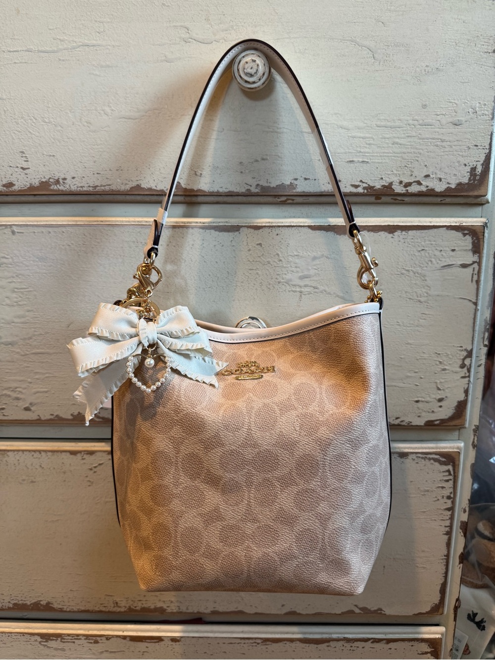 NWT Coach Mini City Bucket Crossbody Bag Gold Sand Signature Canvas Bow Charm
